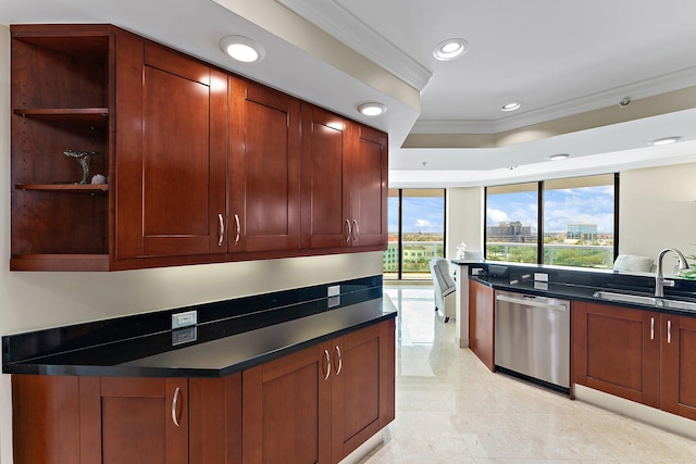 kitchen with a tray ceiling, sink, crown molding, and stainless steel dishwasher