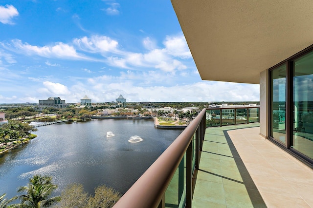 balcony featuring a water view