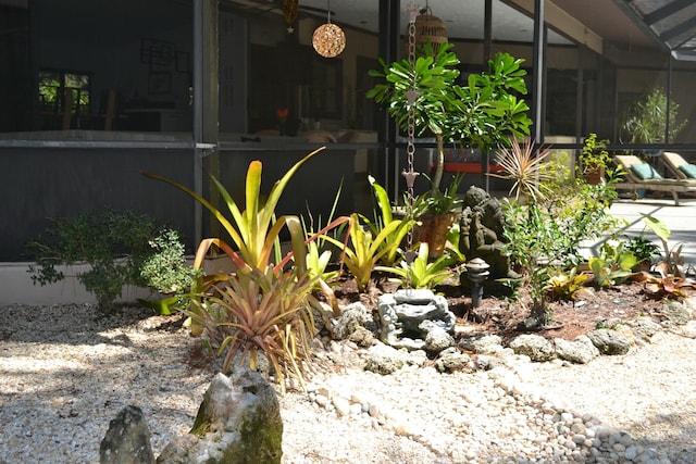 view of yard with a lanai