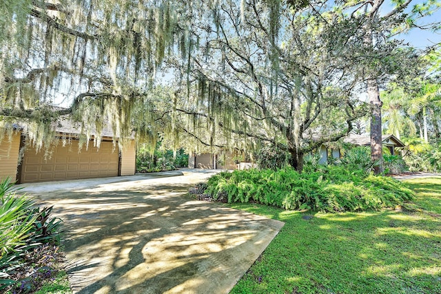 view of yard featuring a garage