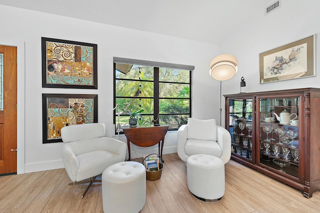 sitting room with light wood-type flooring