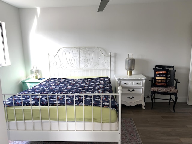 bedroom featuring dark hardwood / wood-style floors