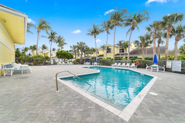 view of swimming pool with a patio