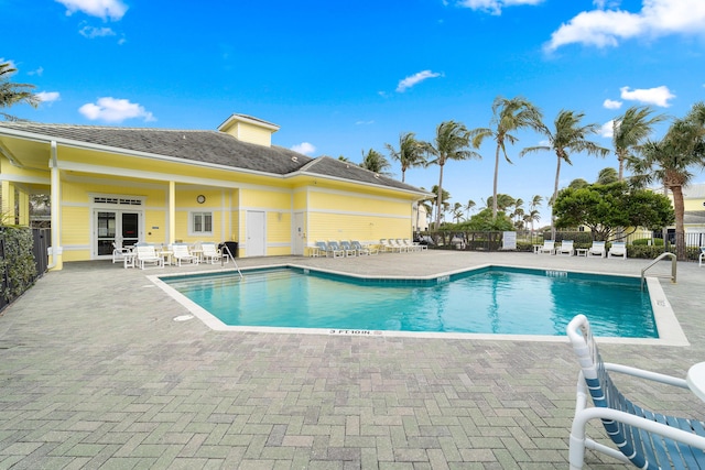 view of swimming pool featuring a patio area