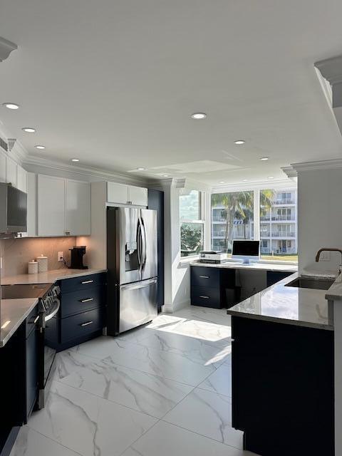 kitchen featuring black range with electric cooktop, a sink, white cabinetry, marble finish floor, and stainless steel fridge with ice dispenser