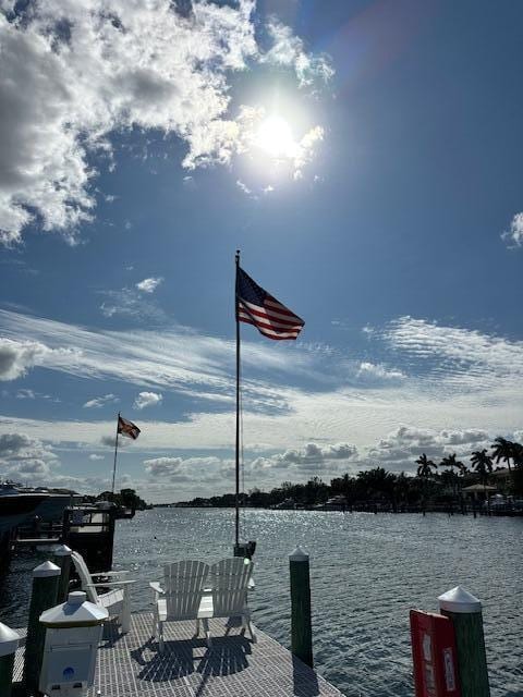 dock area featuring a water view