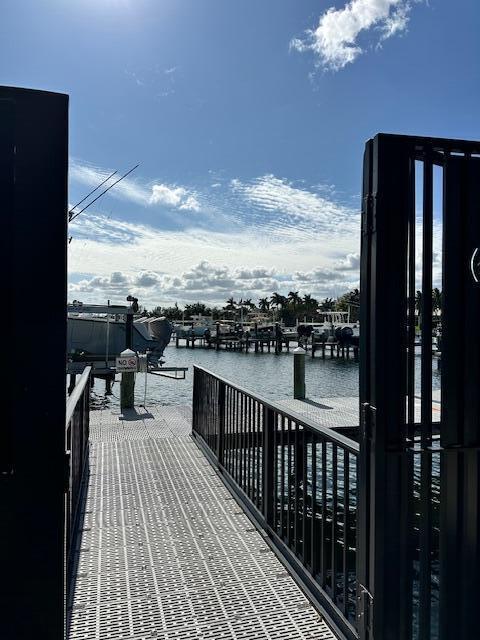 dock area featuring a water view