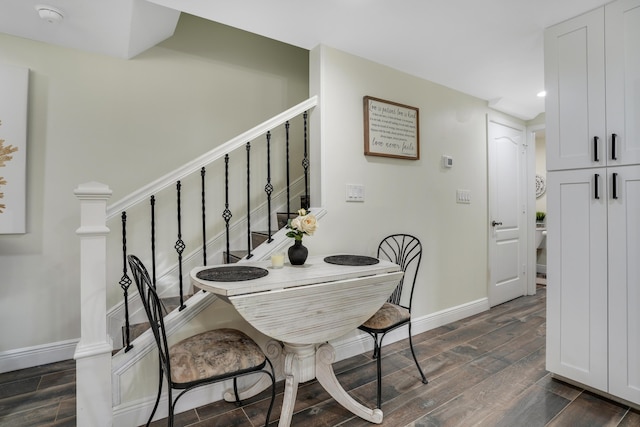 dining space with recessed lighting, stairway, baseboards, and dark wood-type flooring