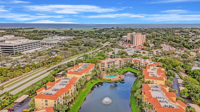 drone / aerial view with a water view