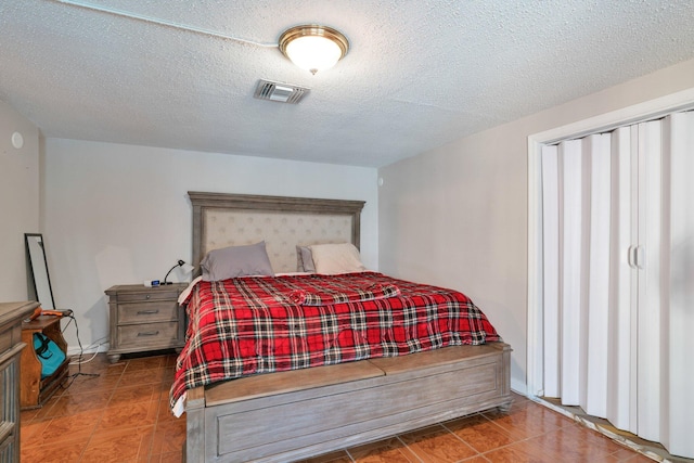 bedroom with a textured ceiling