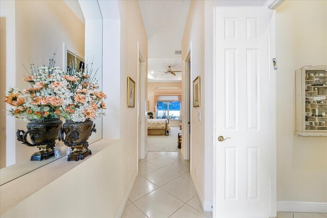 hallway featuring light tile patterned floors