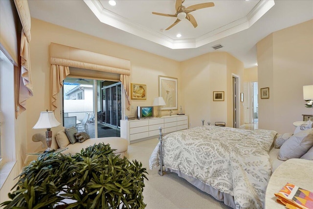 carpeted bedroom with access to outside, ornamental molding, a raised ceiling, and ceiling fan