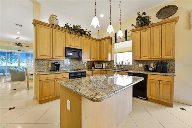 kitchen with sink, crown molding, light tile patterned floors, black appliances, and a kitchen island