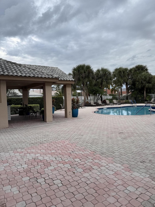 view of pool with a gazebo and a patio area