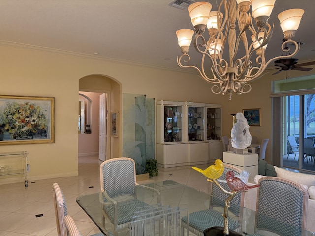 dining room featuring light tile patterned flooring, crown molding, and ceiling fan with notable chandelier