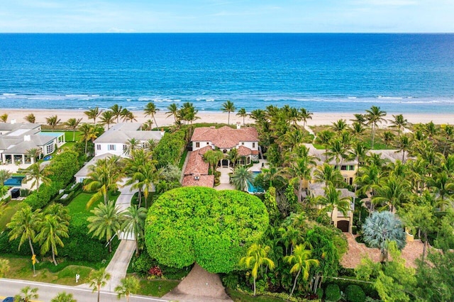 aerial view featuring a water view and a beach view