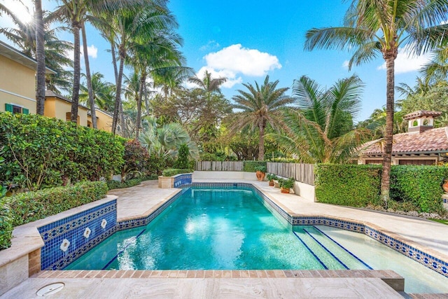 view of pool featuring a patio