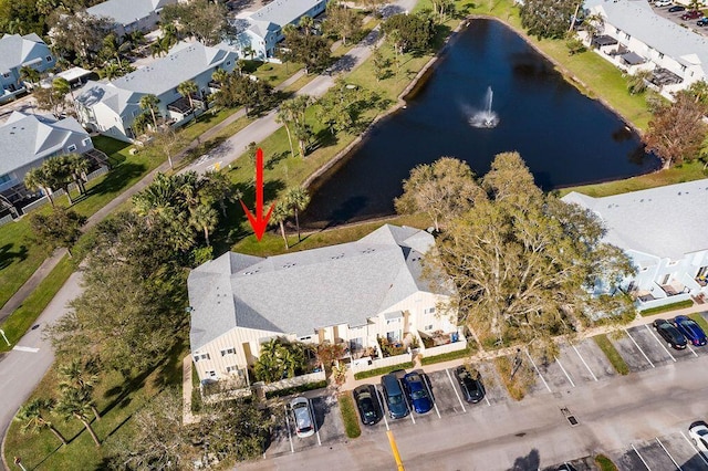 aerial view featuring a water view and a residential view