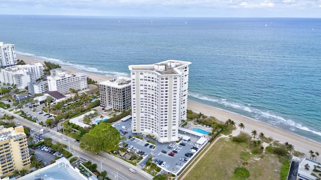 aerial view featuring a water view and a view of the beach