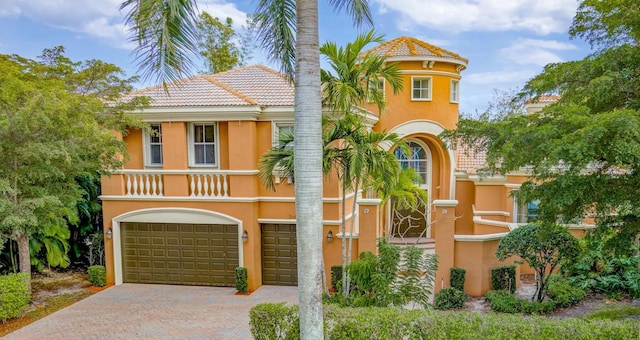 view of front of home with a garage