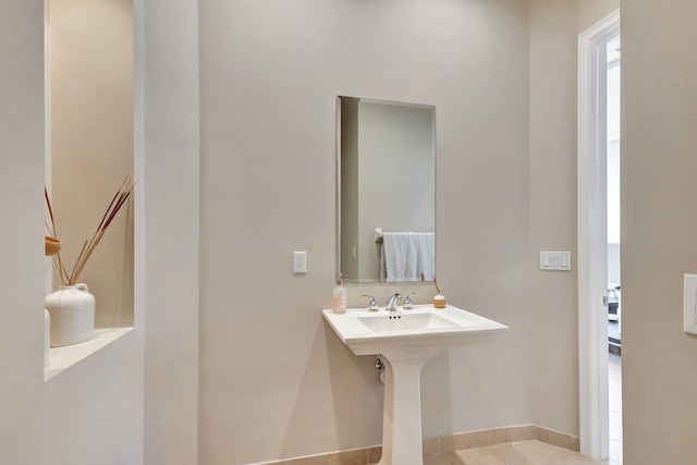 bathroom with tile patterned flooring