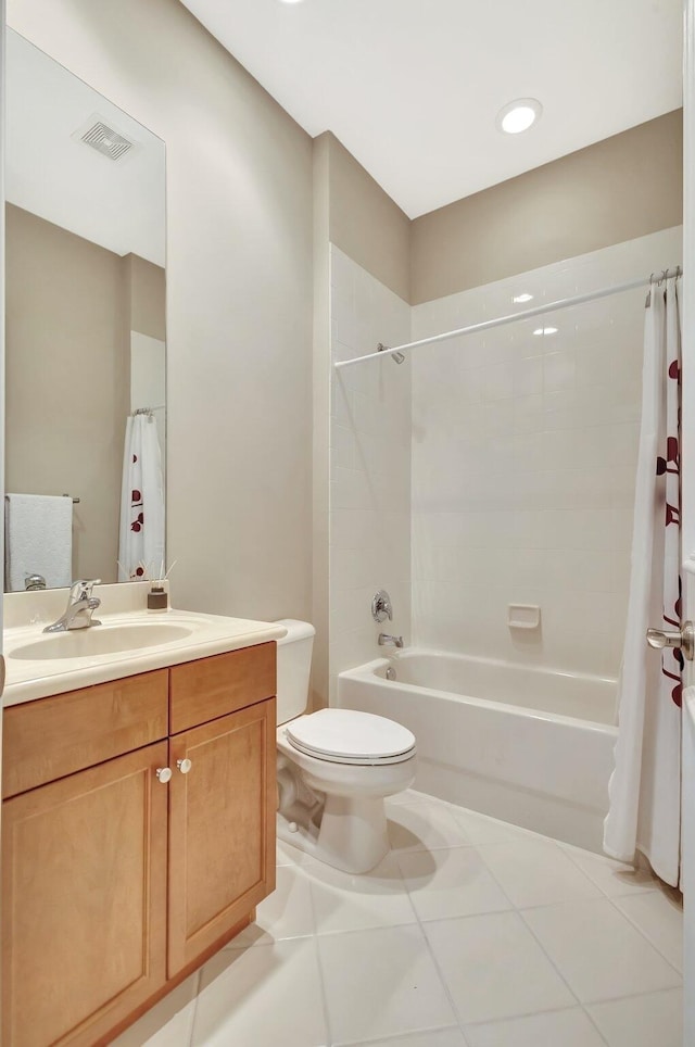 full bathroom with toilet, shower / bathtub combination with curtain, tile patterned floors, and vanity