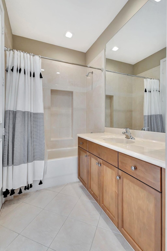 bathroom featuring vanity, shower / tub combo, and tile patterned flooring