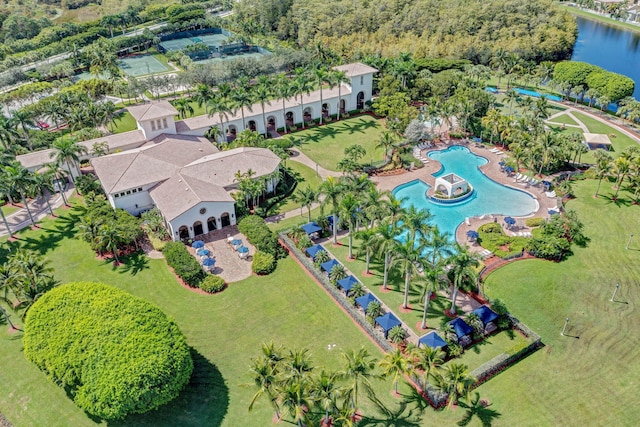 birds eye view of property with a water view