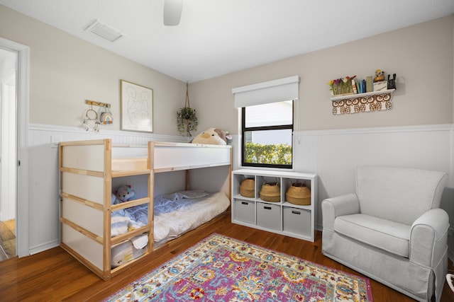 bedroom featuring ceiling fan and hardwood / wood-style flooring