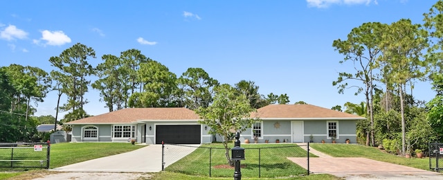 ranch-style house with a front yard and a garage