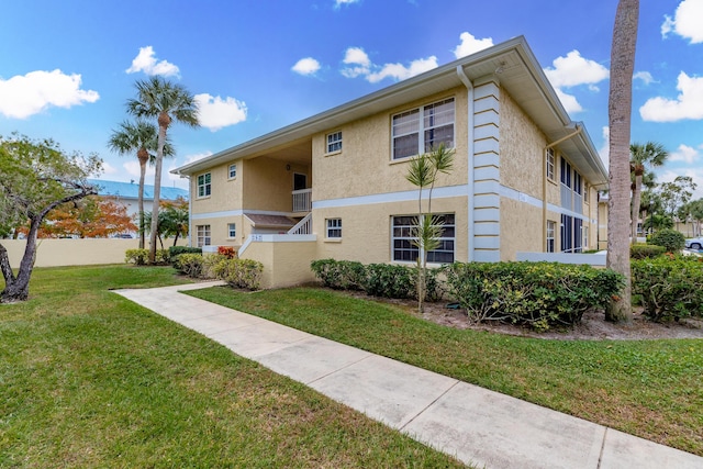 exterior space featuring a front lawn