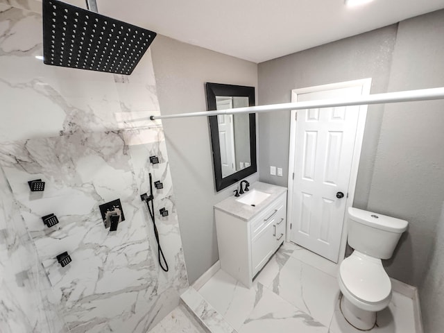 bathroom featuring toilet, walk in shower, and vanity