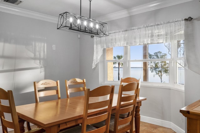 dining space with an inviting chandelier and crown molding