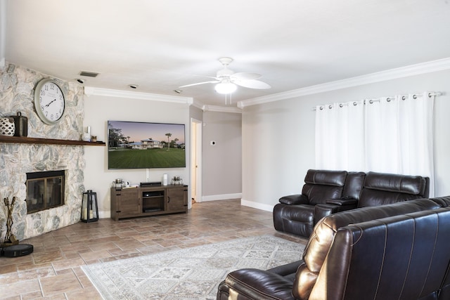 living room with ceiling fan, ornamental molding, and a fireplace