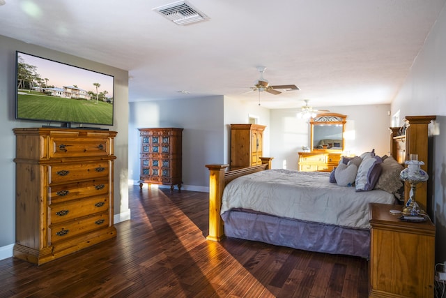 bedroom featuring ceiling fan and dark hardwood / wood-style floors