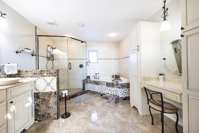 bathroom with independent shower and bath and vanity