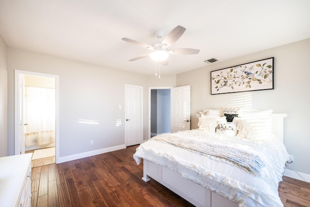 bedroom with ceiling fan, connected bathroom, and dark hardwood / wood-style floors