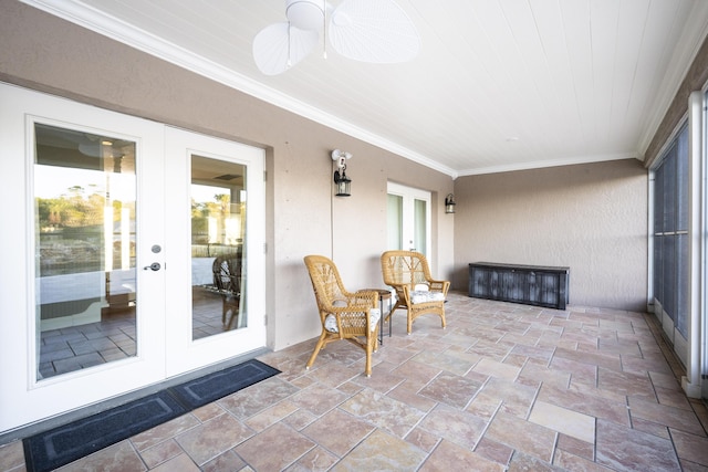 sunroom with wood ceiling, ceiling fan, and french doors