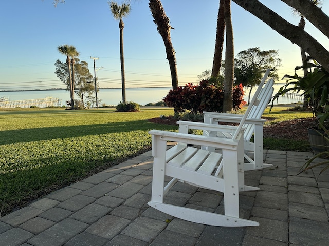 view of patio / terrace with a water view