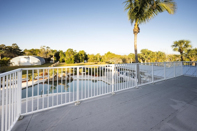 view of gate featuring a water view