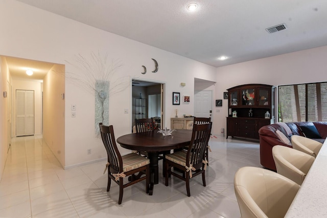 view of tiled dining space