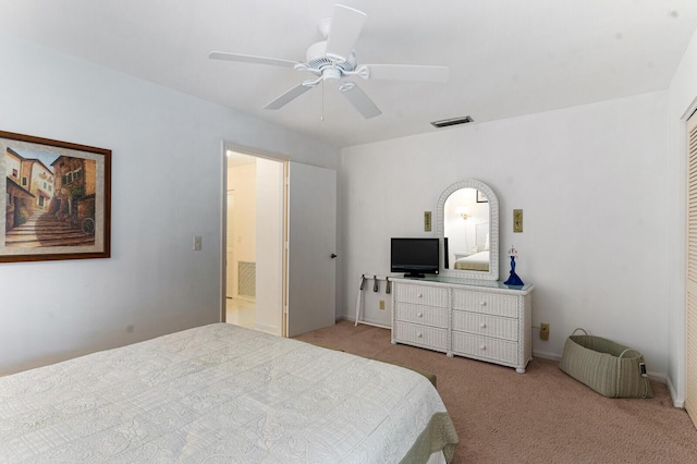 carpeted bedroom with ceiling fan