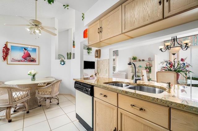 kitchen featuring light tile patterned flooring, sink, light stone counters, light brown cabinets, and dishwashing machine