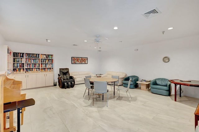 dining space with ceiling fan