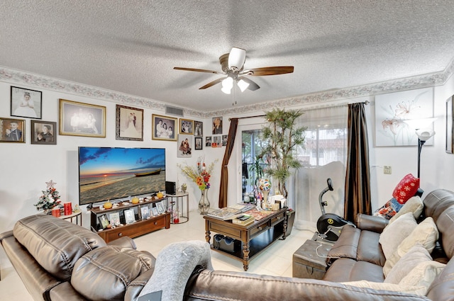 living room with light tile patterned floors, a textured ceiling, and ceiling fan