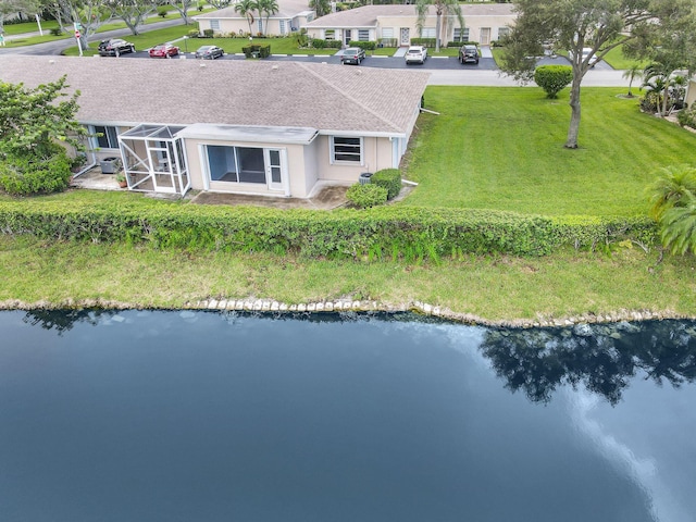 drone / aerial view featuring a water view