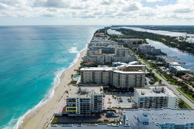 aerial view featuring a water view and a beach view