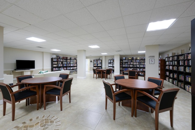 dining space featuring a paneled ceiling