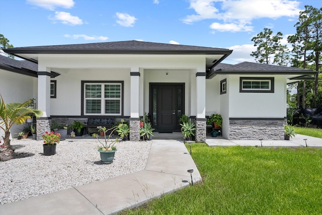 prairie-style house with a front yard