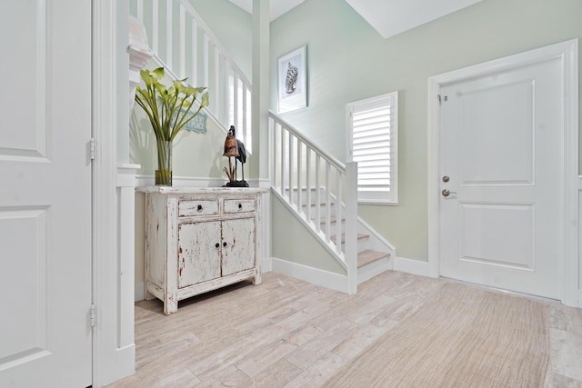 foyer entrance featuring light hardwood / wood-style flooring